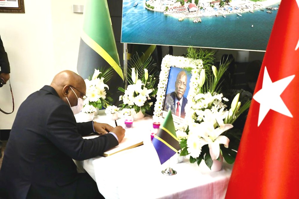 H.E Mulumba Tshidimba Ambassador of Democratic Republic of Congo in Turkey signing the book of condolences at the Embassy in Ankara prior to the death of 5th Tanzania President Dr. John Magufuli.