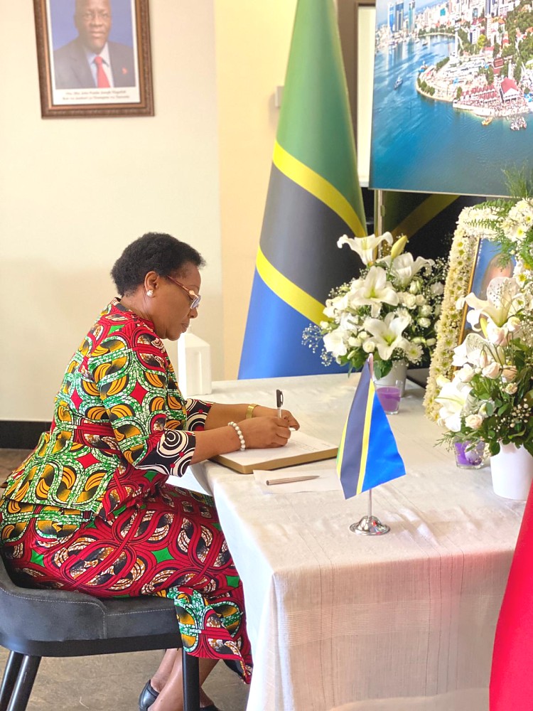 H.E the Ambassador of United Republic of Tanzania in Turkey Prof. Elizabeth K. Kiondo signing the book of condolences at the  Embassy in Ankara prior to      the death of Former President Mkapa